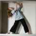 a fearful woman having claustrophobia in a cabinet